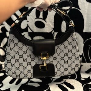 Gucci Jackie Vintage cloth handbag
brand new good condition
Black, Gray Cloth